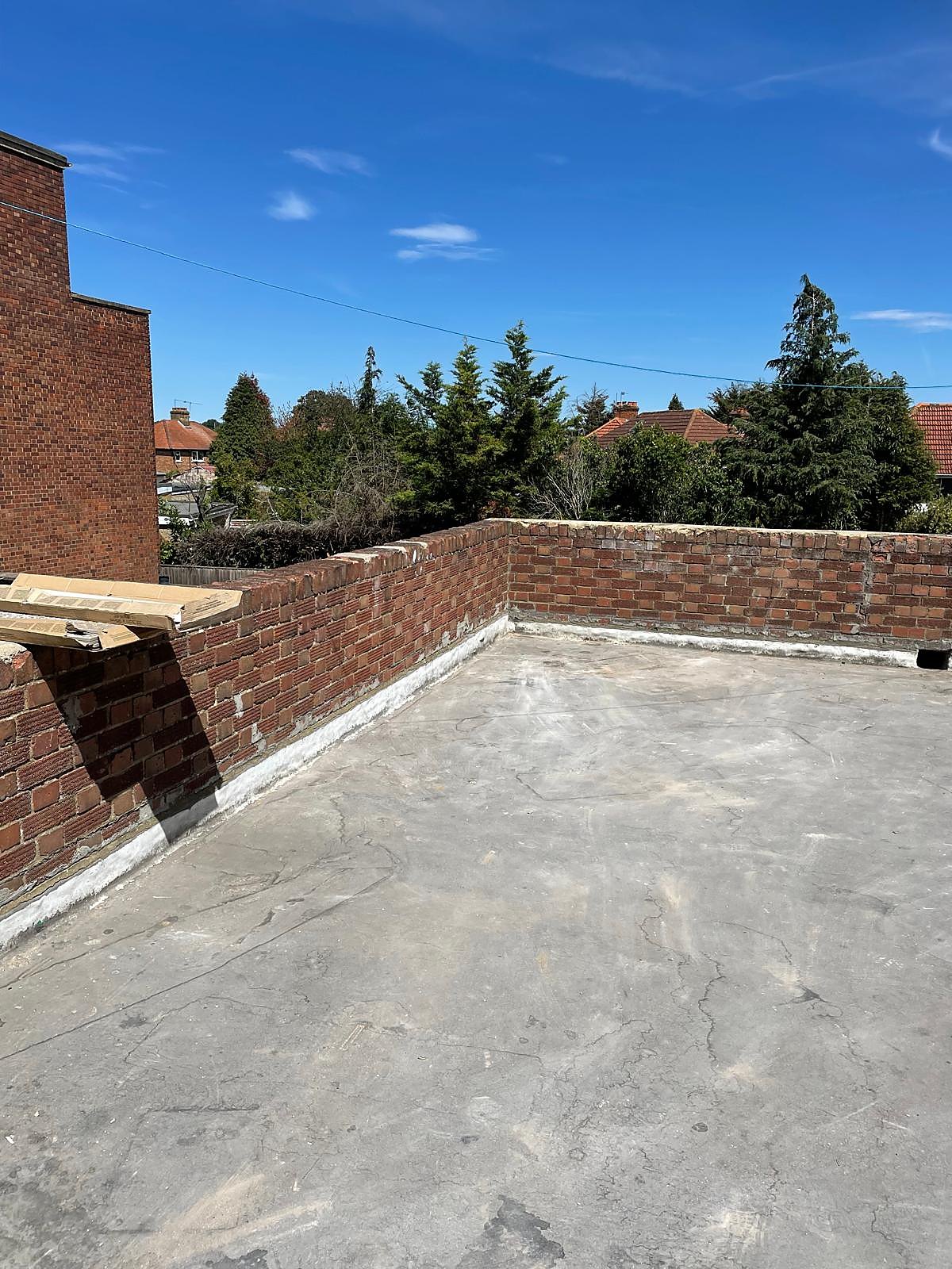 Rooftop clearance after — cleared clean rooftop