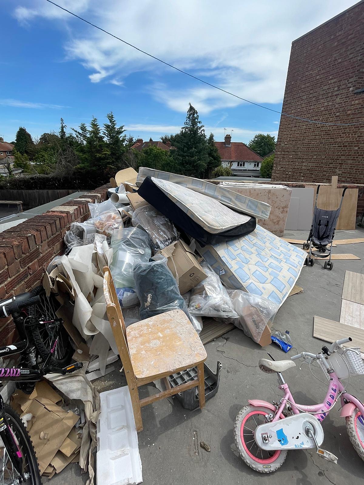 Rooftop clearance before — furniture and mixed waste